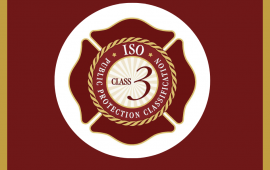 Maroon and gold circular logo with the words Class 3 in the middle of circle and the words ISO, Public Protection Classification