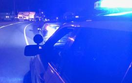HPD Officer condutcing a motor vehicle stop at night