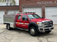 Red 2015 Ford F550 Squad with chrome rear