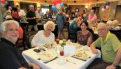 Seniors Eating in a Big Dining Room