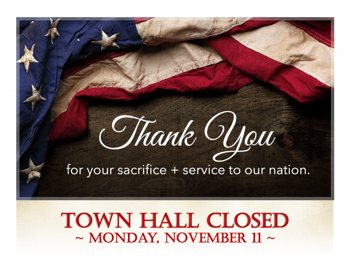 closed veterans day sign